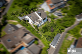 Einfamilienhaus mit ELW (Hanglage) und Weitblick in das Maintal bis zur Festung Marienberg - Vorderansicht