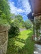 Einfamilienhaus mit ELW (Hanglage) und Weitblick in das Maintal bis zur Festung Marienberg - Garten hinterm Haus