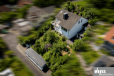 Einfamilienhaus mit ELW (Hanglage) und Weitblick in das Maintal bis zur Festung Marienberg - Seitenansicht