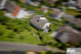 Einfamilienhaus mit ELW (Hanglage) und Weitblick in das Maintal bis zur Festung Marienberg - Rückseite